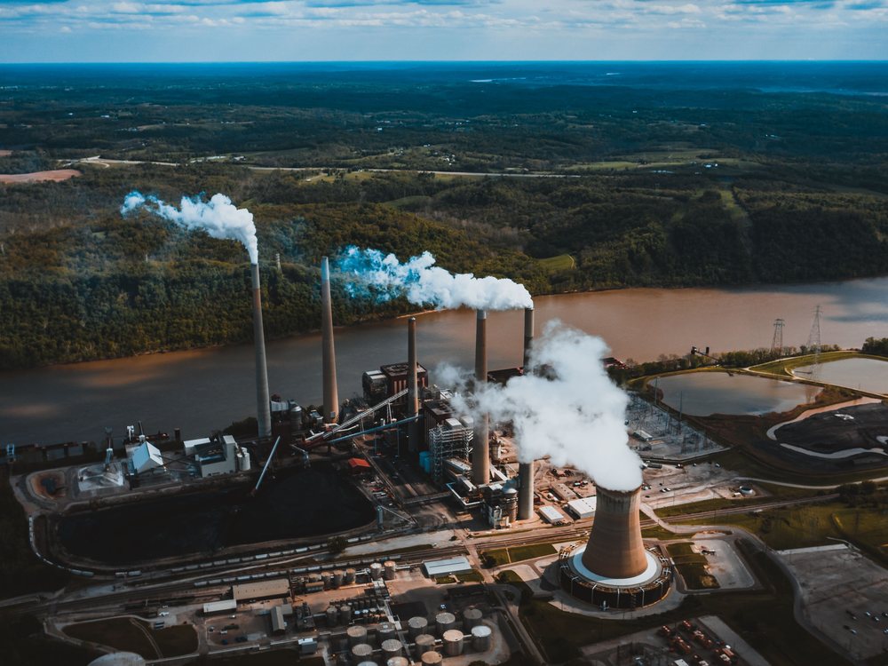 A thermal power station with cooling towers.